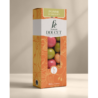Pomme d’Amour™ – Pâte de fruits à la pomme enrobée de gianduja cannelle et de chocolat blanc