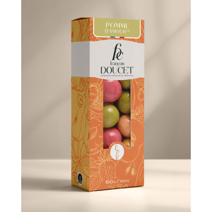Pomme d’Amour™ – Pâte de fruits à la pomme enrobée de gianduja cannelle et de chocolat blanc